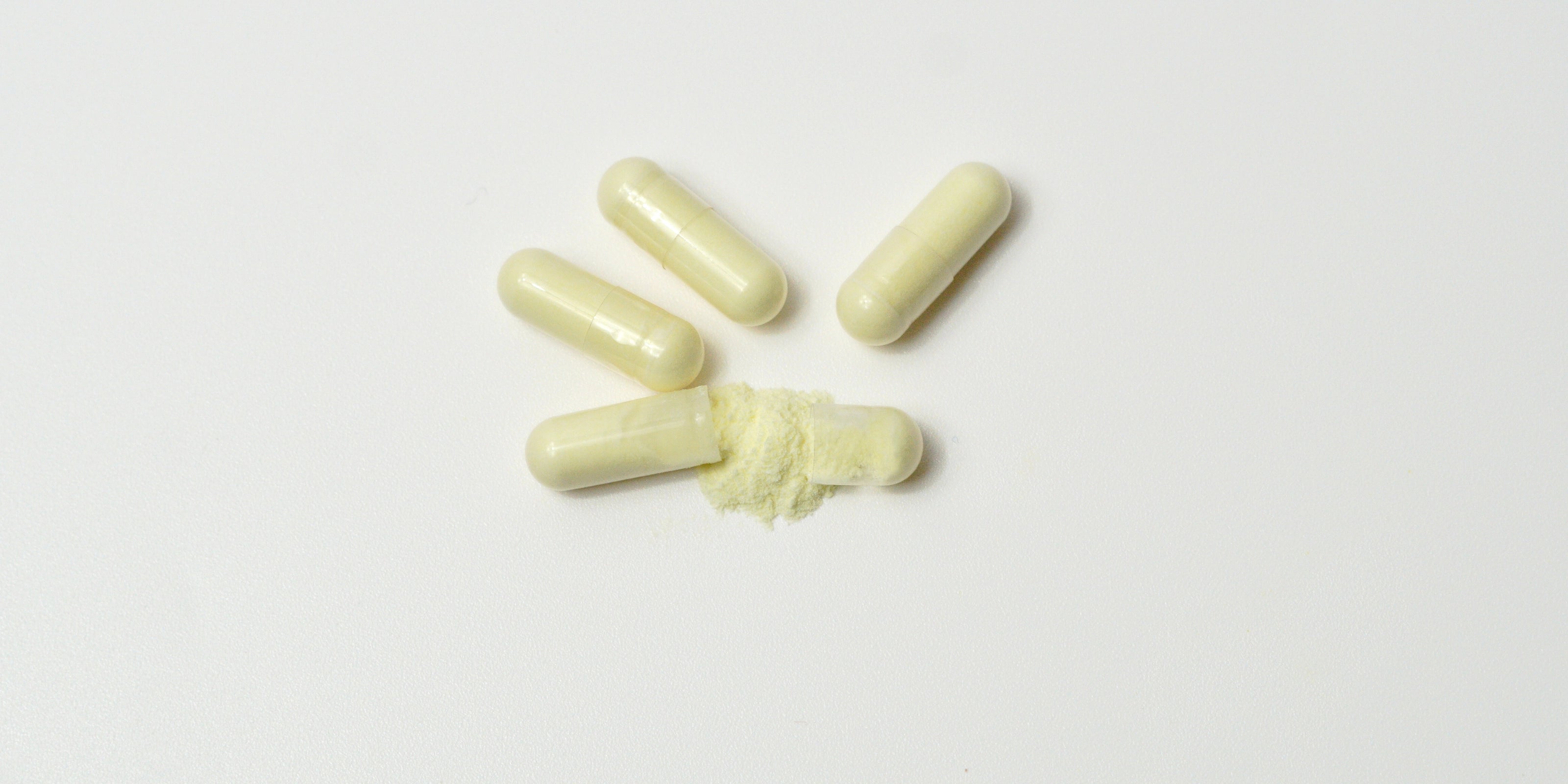 Alpha lipoic acid (ALA) capsules on a white background for brain health and nervous system support.